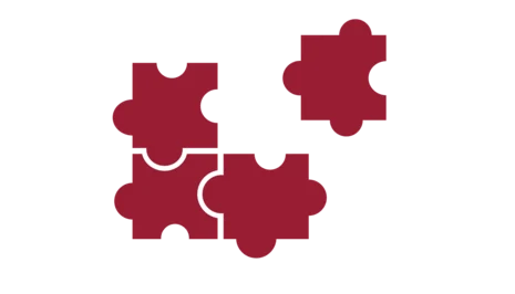 Pictogramm von vier Puzzleteilen, die ineinander passen